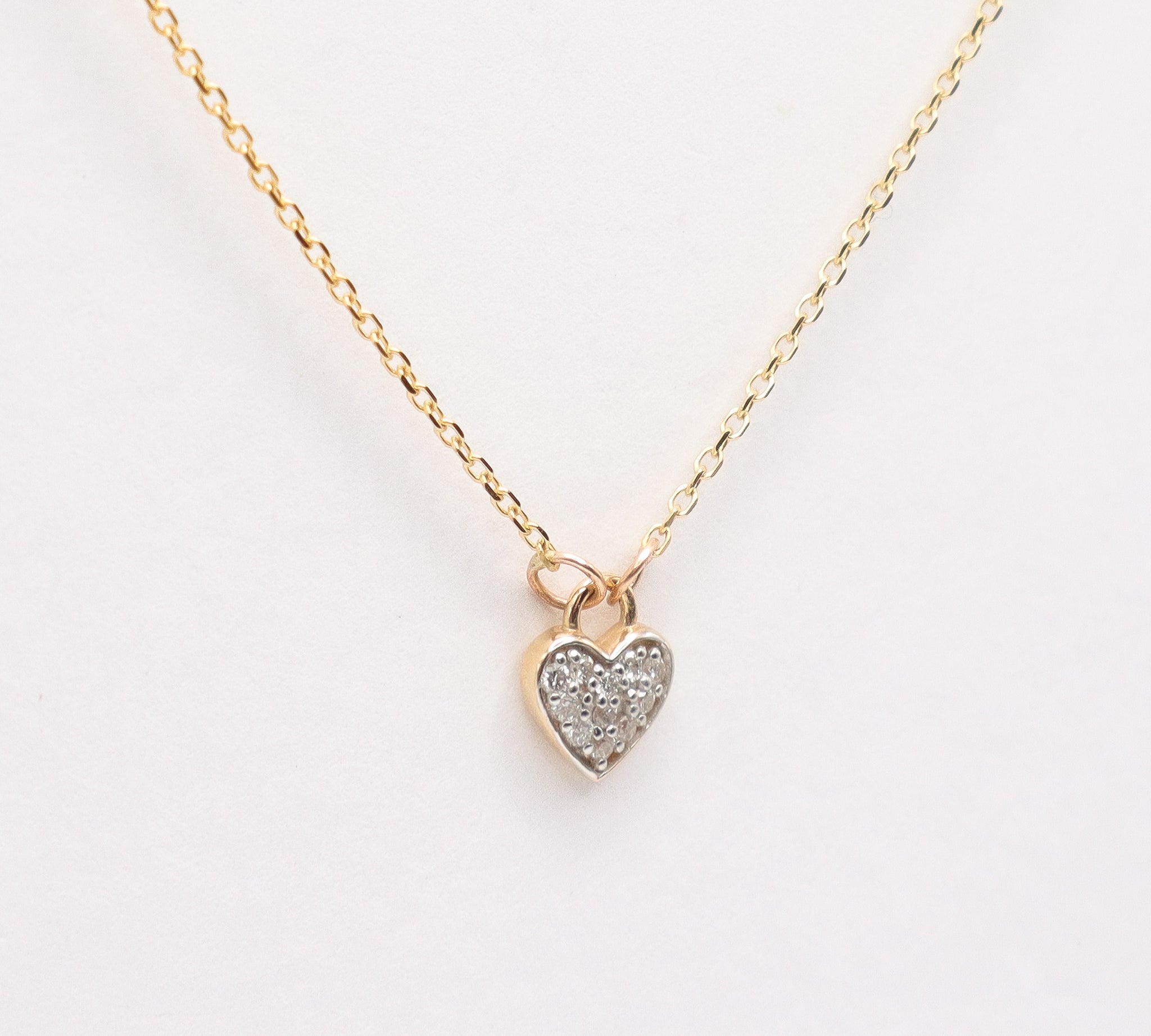 Fine Jewelry Line: Diamond Heart Necklace, closeup view