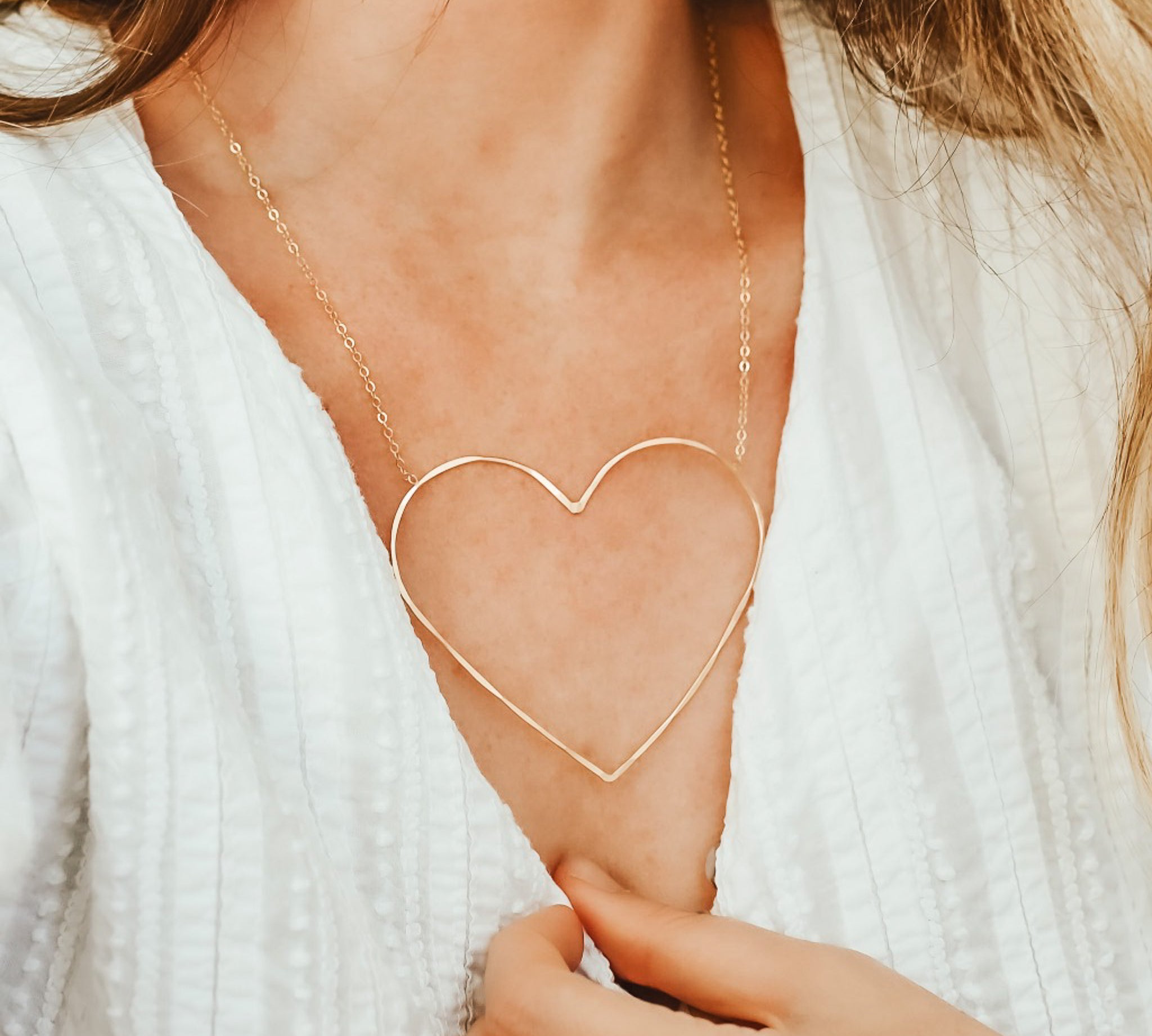 Heart of Gold Necklace, shown on model, featured image