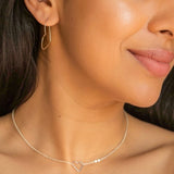 Petite Silver Heart Hoop Earrings, shown on model