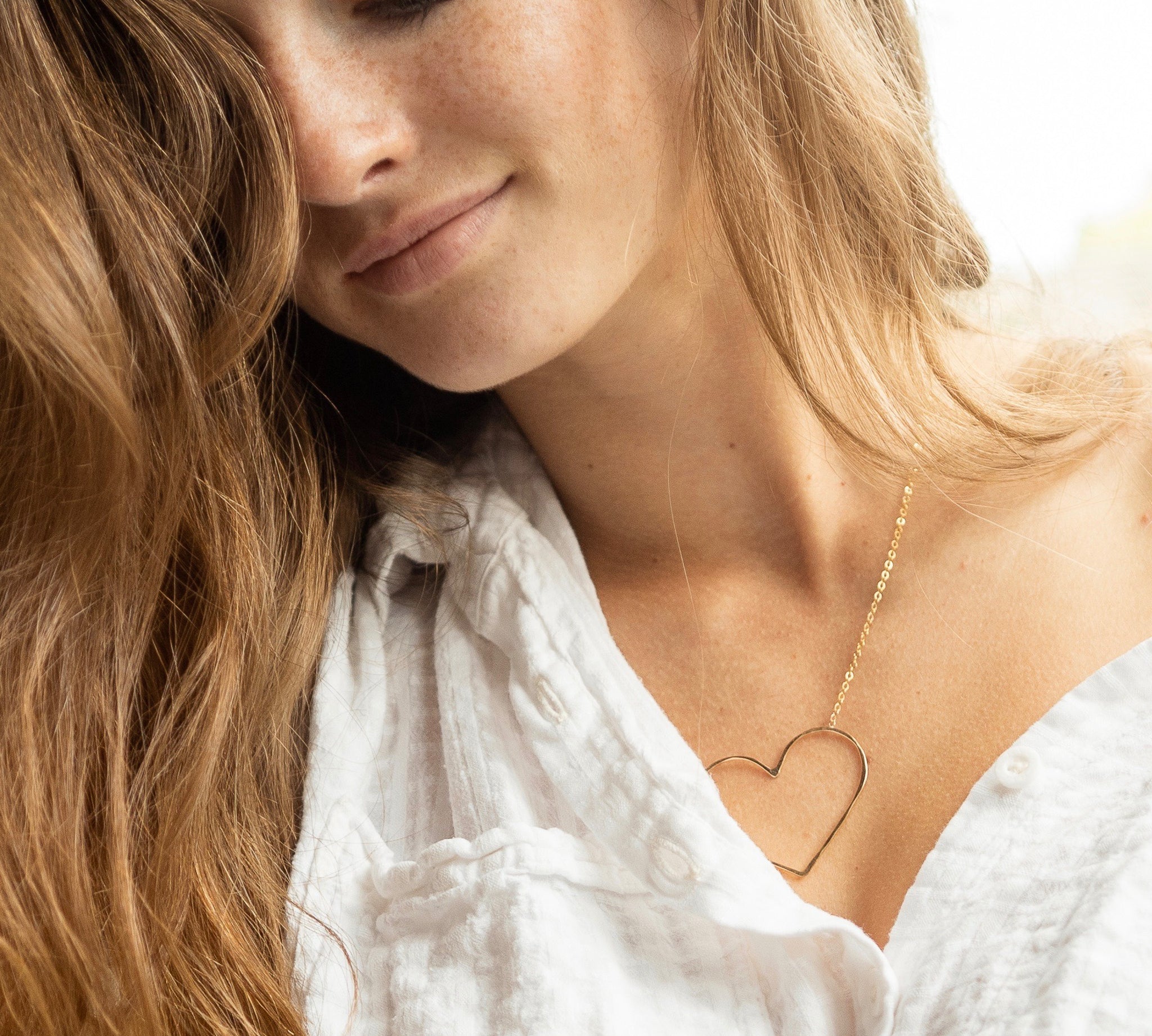 Petite Heart of Gold Necklace, shown on model