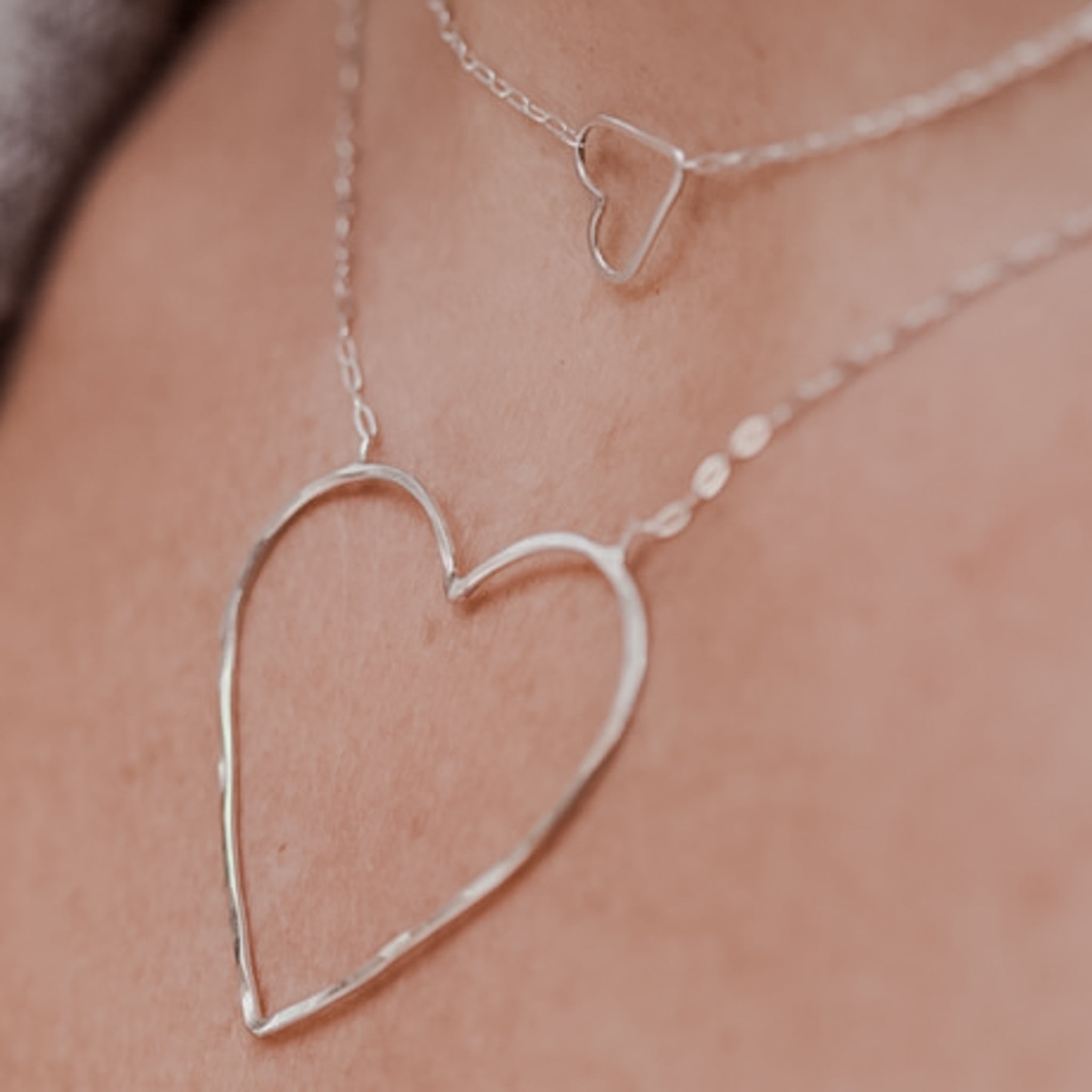 Silver Lining and Sweetheart Necklaces, shown on model