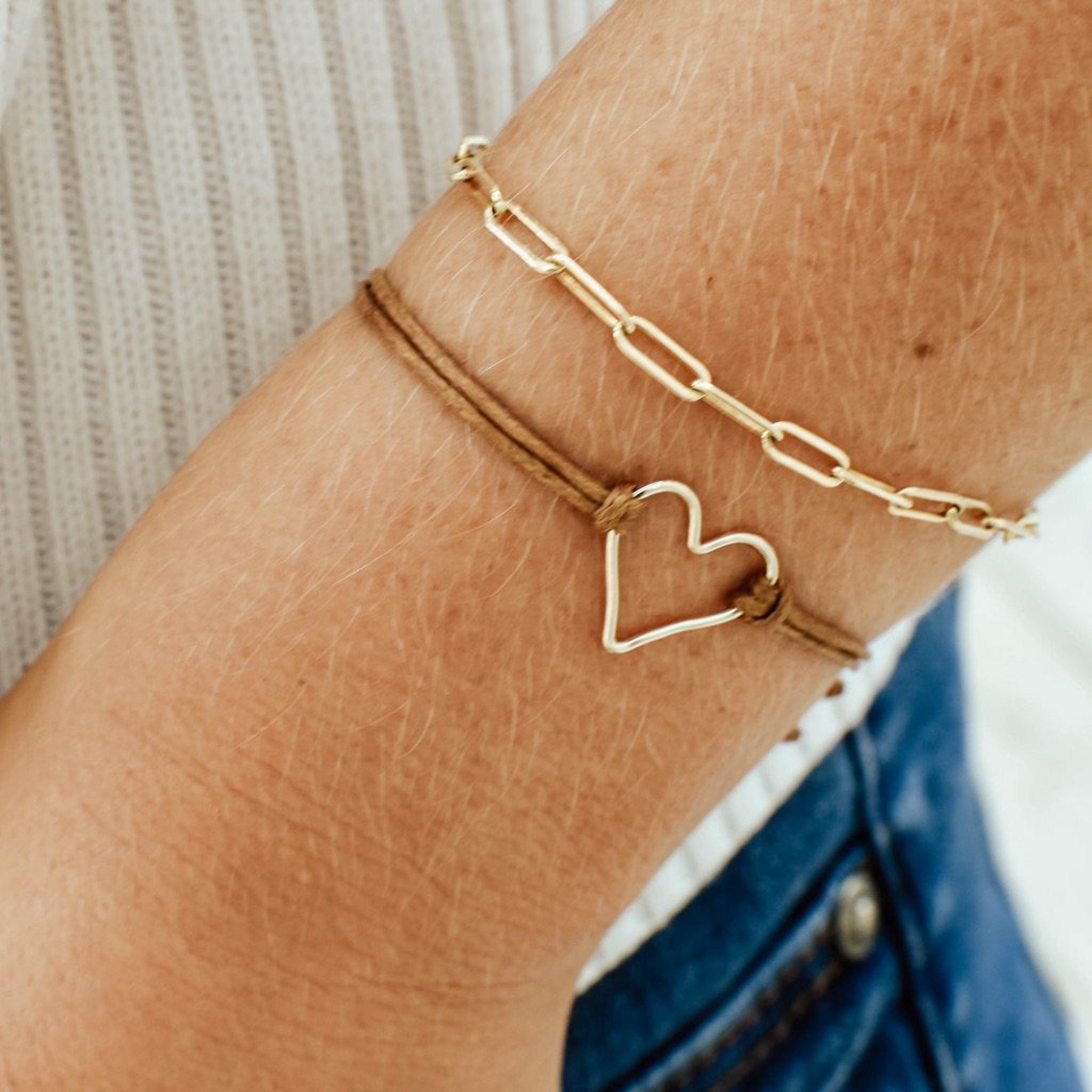 'Armed with Love' and Charming Link Chain Bracelets, shown on model