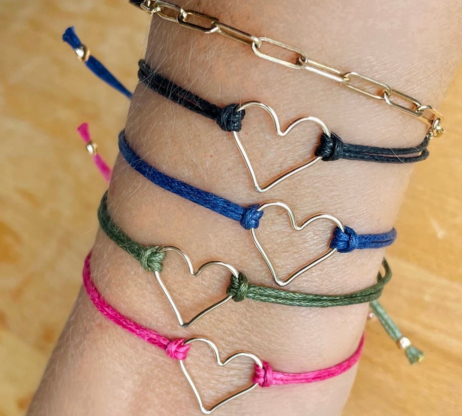 Armed with Love' Bracelets, jewel tones, shown on model