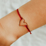 Red 'Armed with Love' Bracelet, shown on model