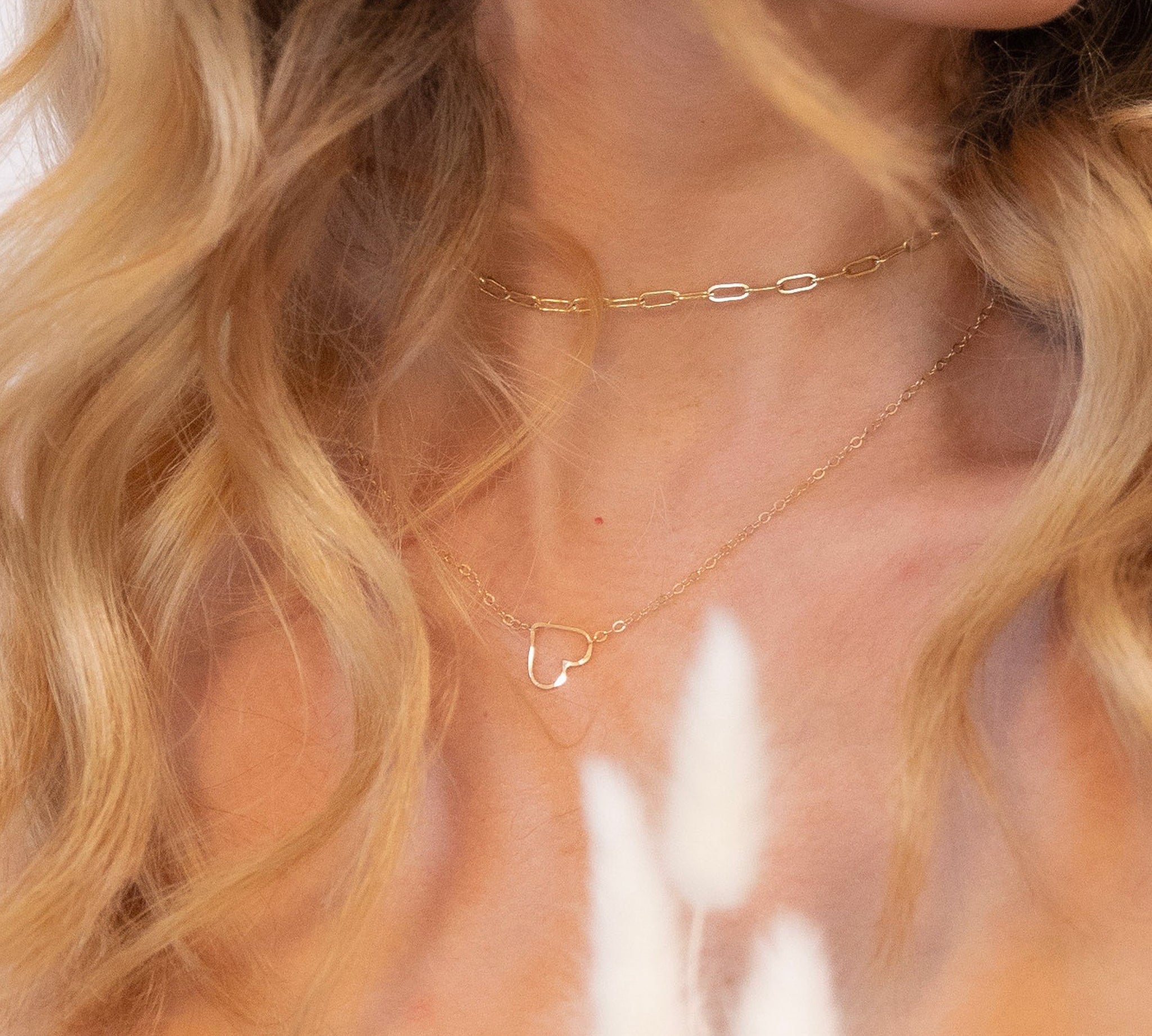 Gold Sweetheart and Charming Link Chain Necklaces, shown on model