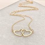 Gold Friendship Necklace on marble background, product image