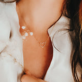 Gold Sweetheart Necklace, shown on model