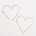 Gold Heart Hoop Earrings, closeup image