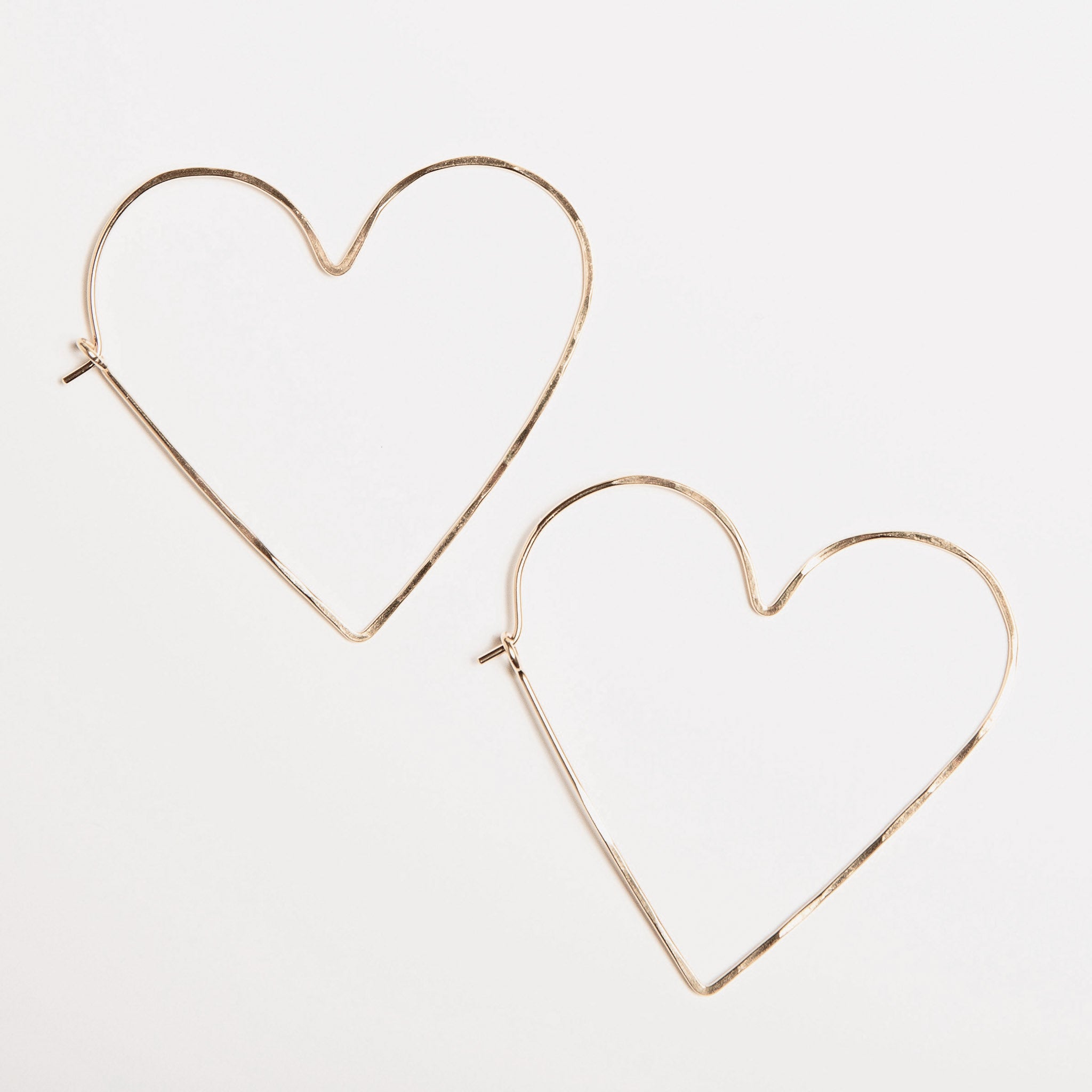 Gold Heart Hoop Earrings, closeup image