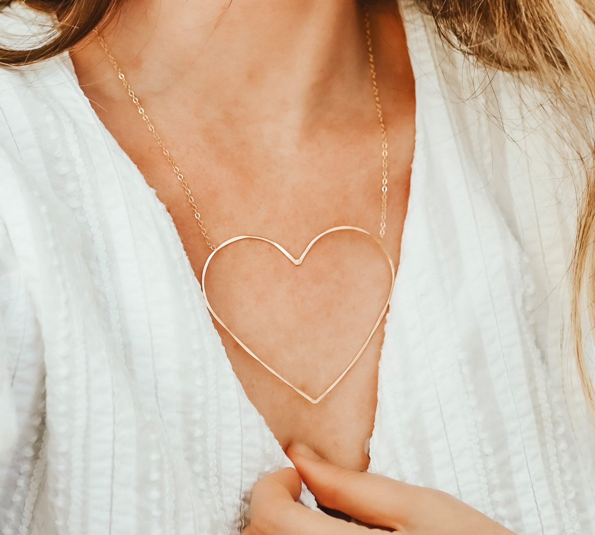 Heart of Gold Necklace, shown on model, featured image