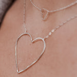 Silver Lining and Sweetheart Necklaces, shown on model