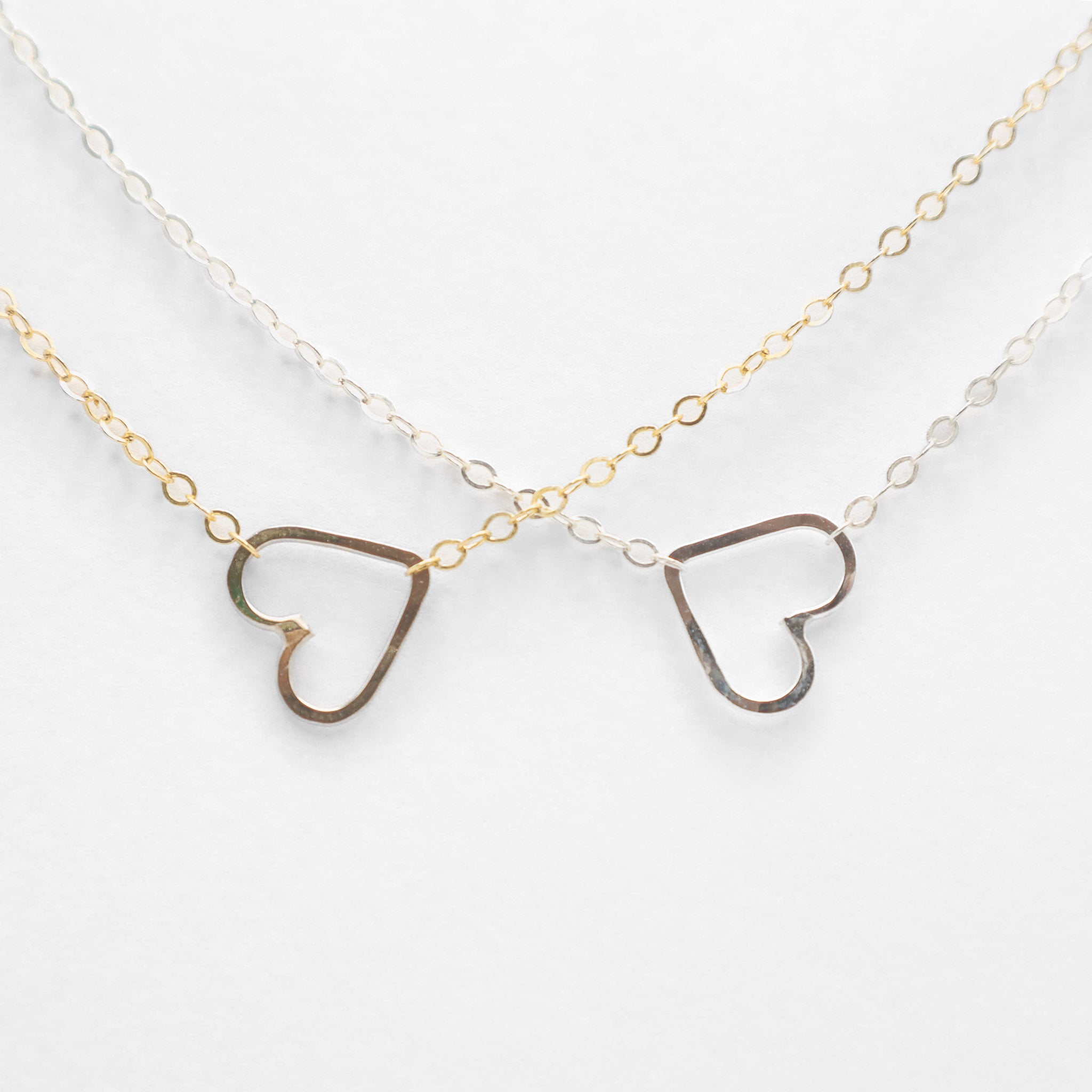 Gold and Silver Sweetheart Necklaces, closeup image