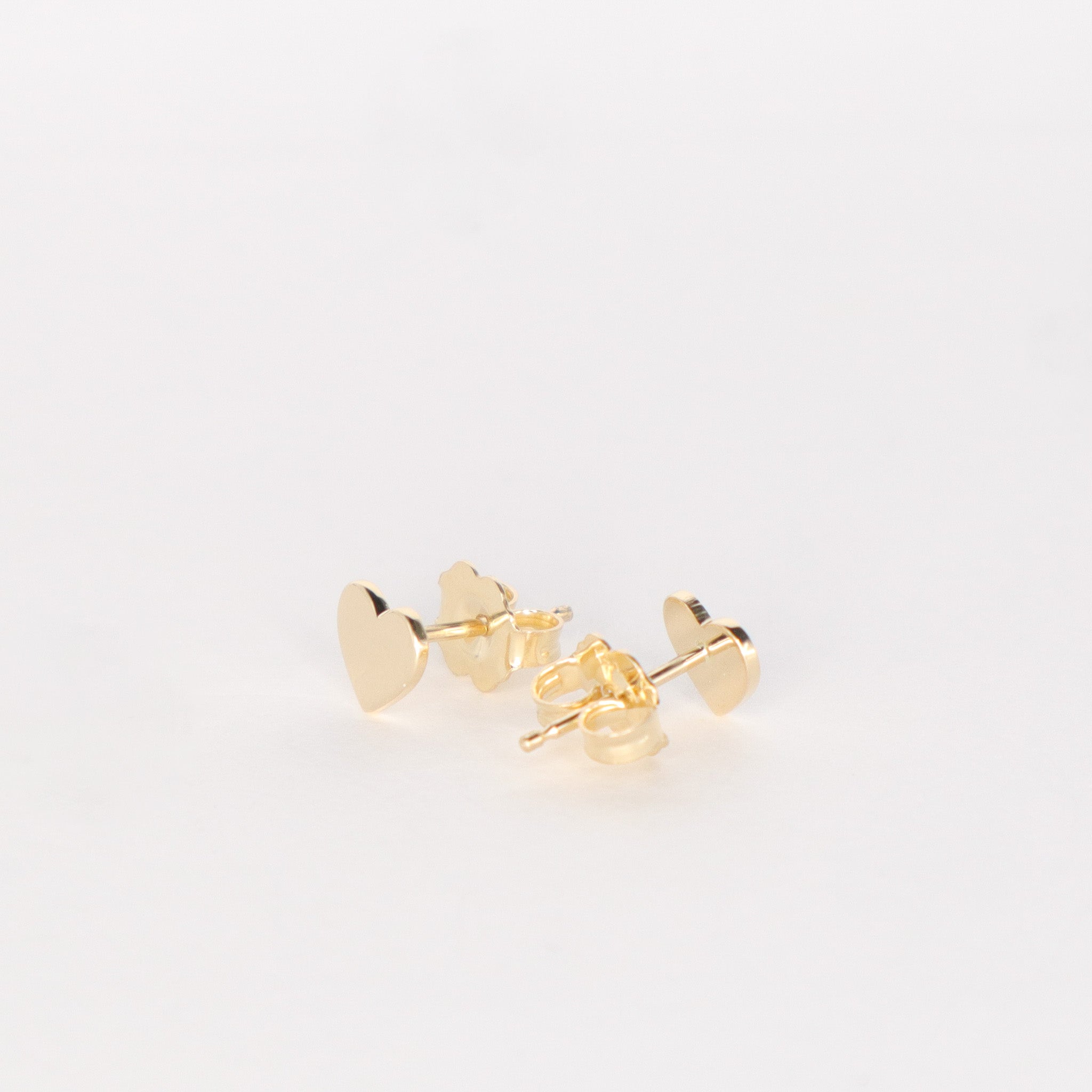Fine Jewelry Line: Tiny Heart Stud Earrings, closeup image