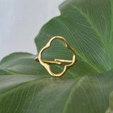 Gold Clover Ring, product on leaf image