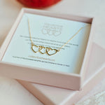 Gold Trinity Necklace, shown in gift box