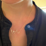Vote Necklace, shown on model